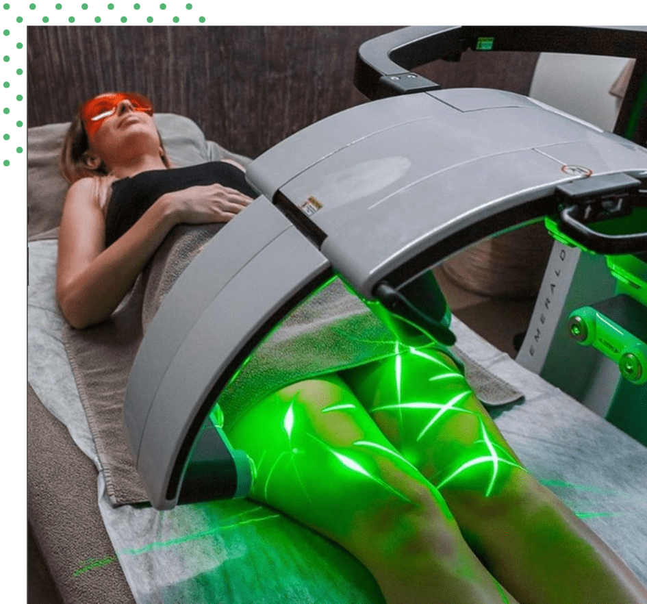 Person undergoing laser treatment on thighs.